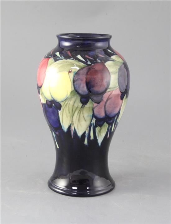 A Moorcroft wisteria baluster vase, height 24cm